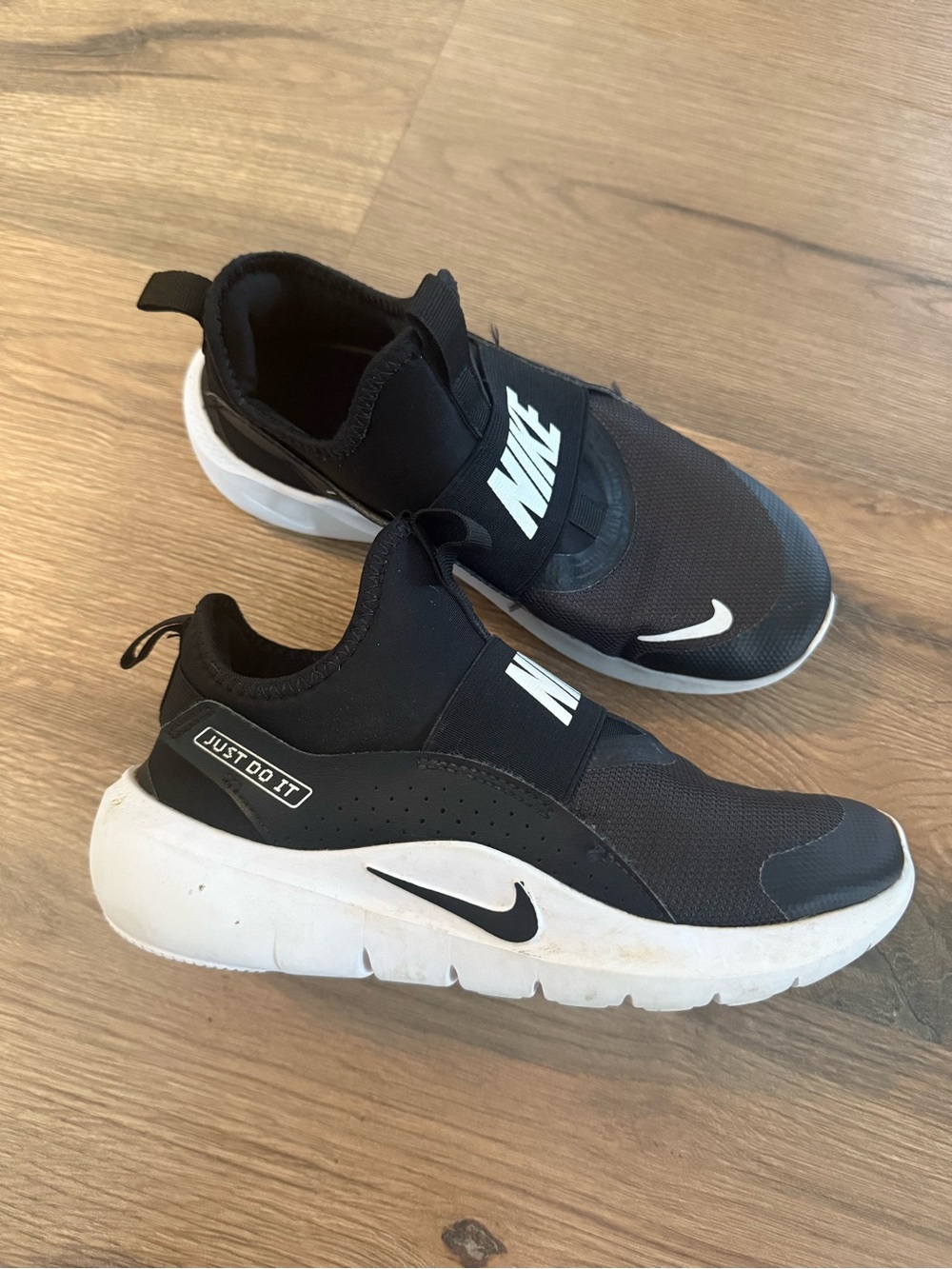 Nike Kids Black and White Slip-On Athletic Sneakers